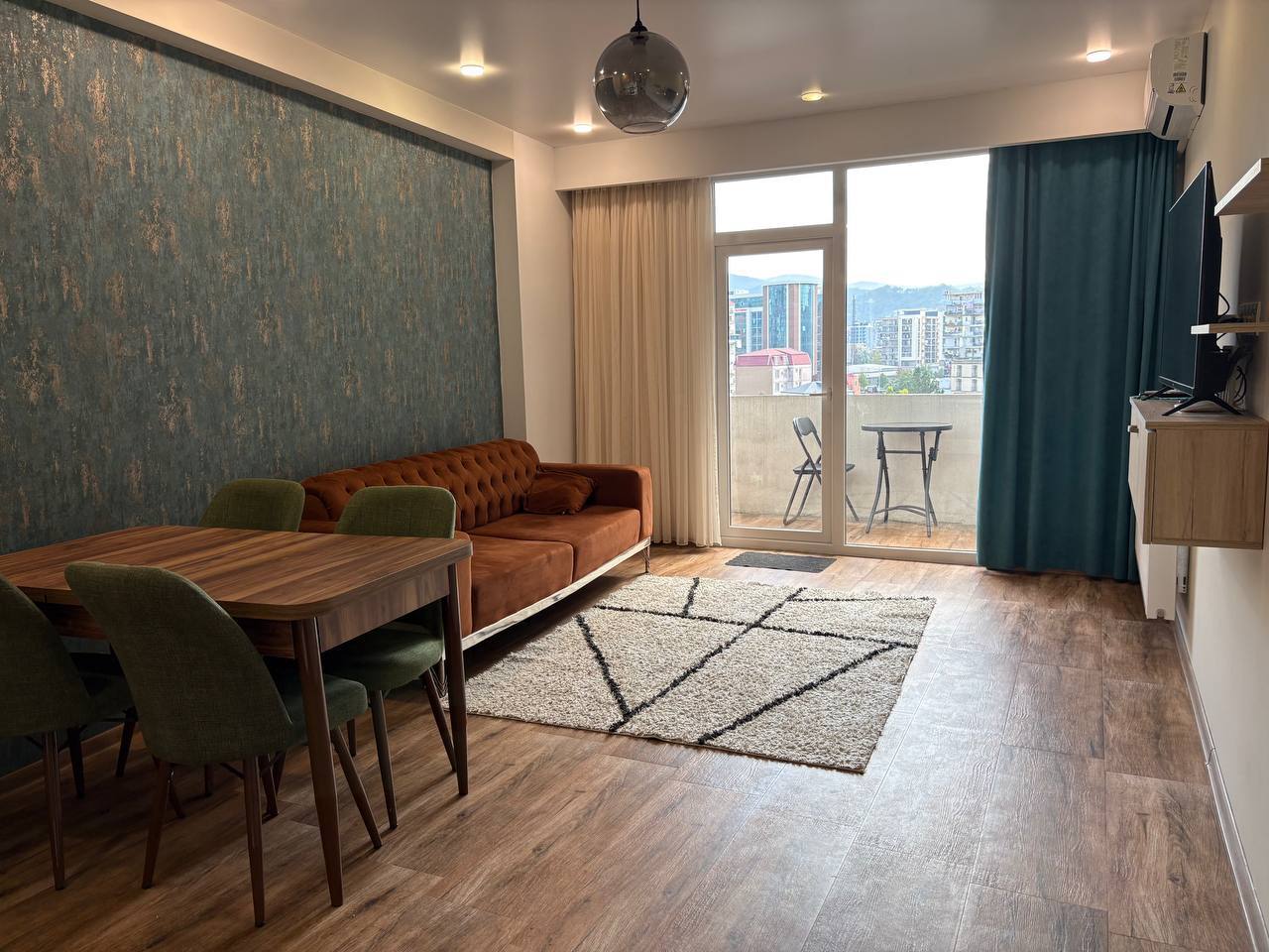 Furnished 2-Bedroom Apartment with Mountain View photo 2 of 8