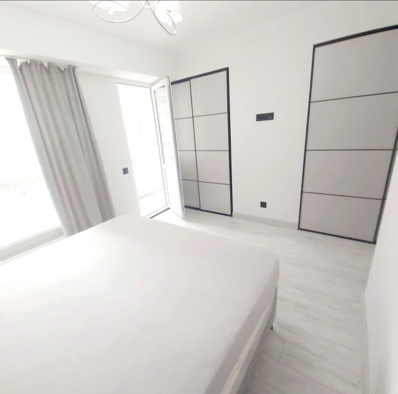 Two-Bedroom Apartment with Living Room in Central Chisinau photo 3 of 8