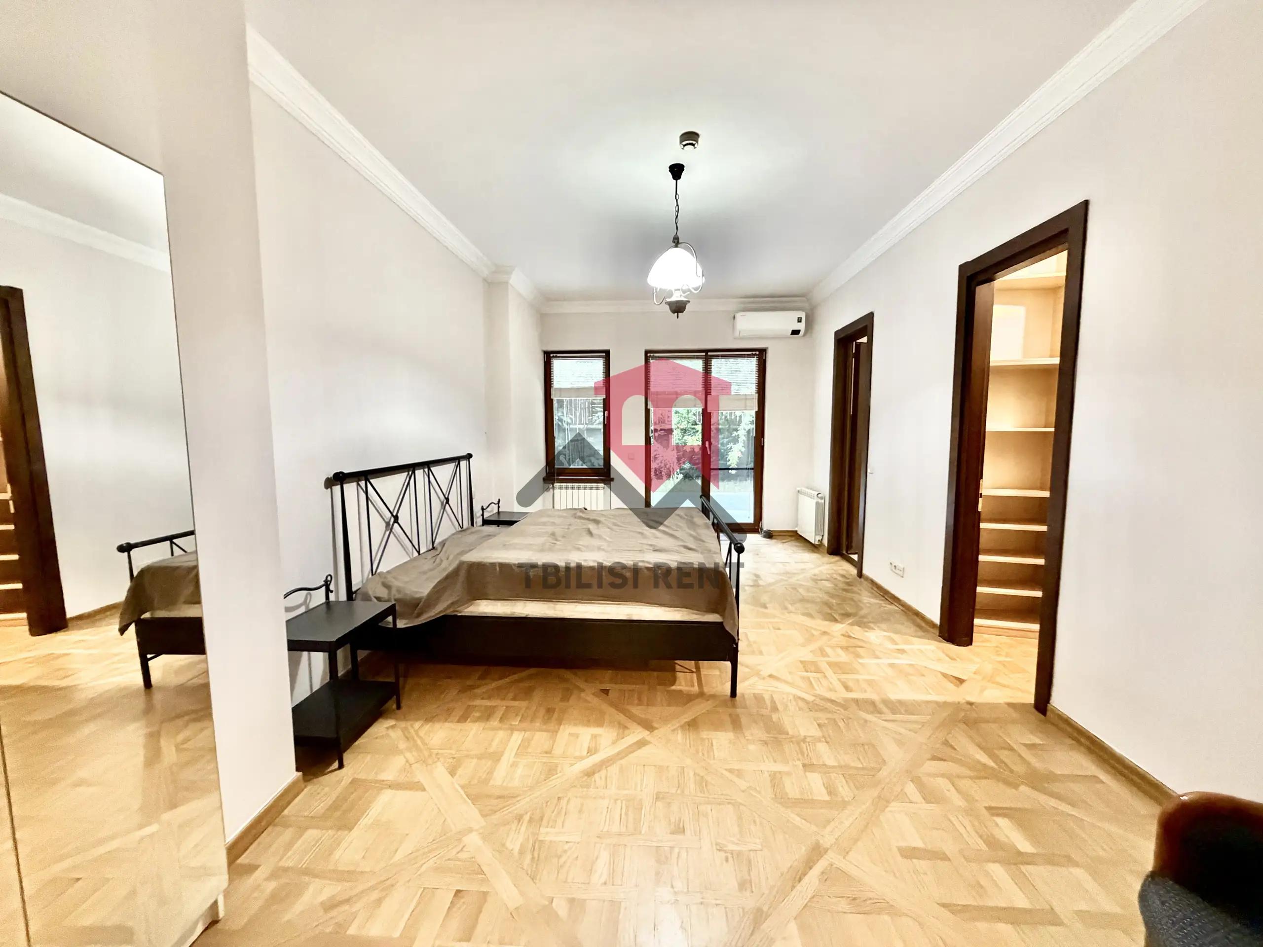 Spacious Apartment with Private Garden in Vake photo 2 of 8