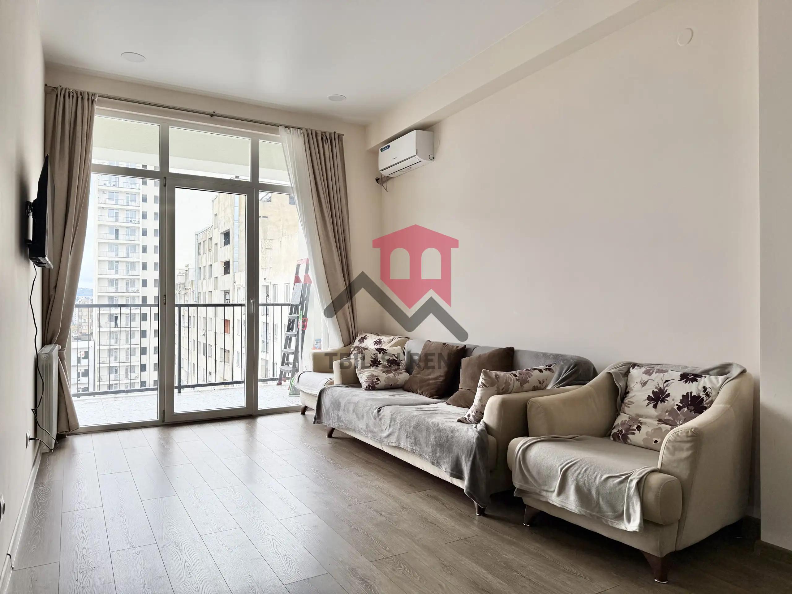 Modern 1-Bedroom Apartment in Axis Palace photo 1 of 8